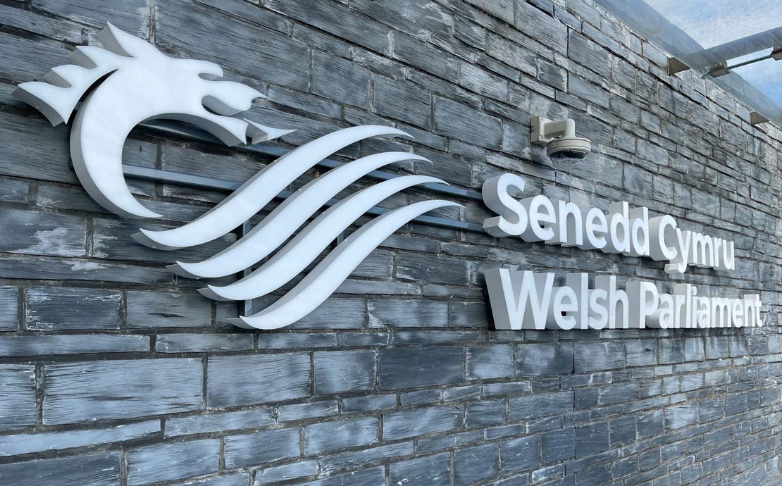 The Senedd branding on the Wales of the Senedd Building