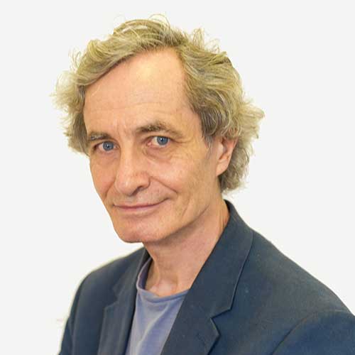 A head shot of Simon