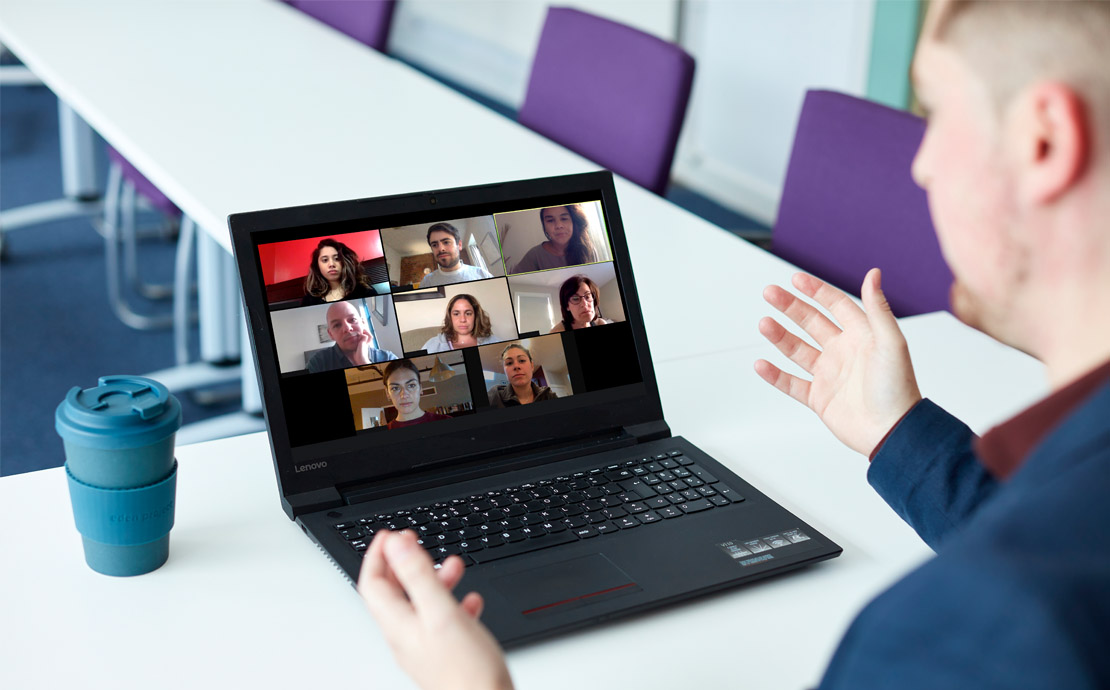 An online meeting happening on a laptop