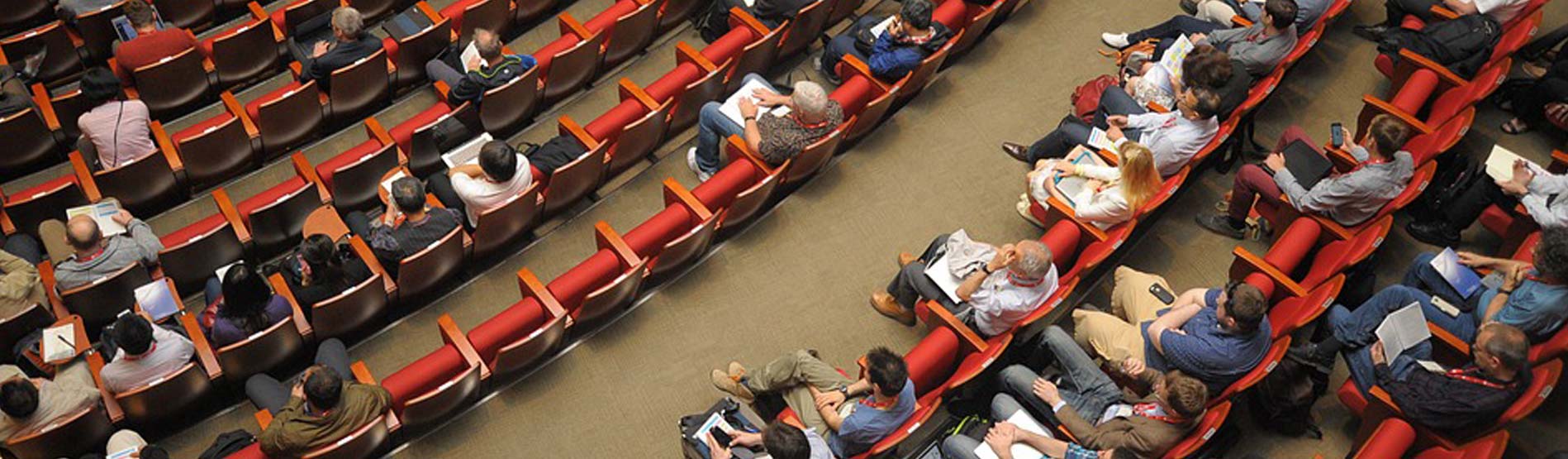 an aerial shot of an audience at a lecture