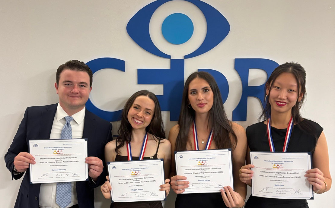 Image of four competing students