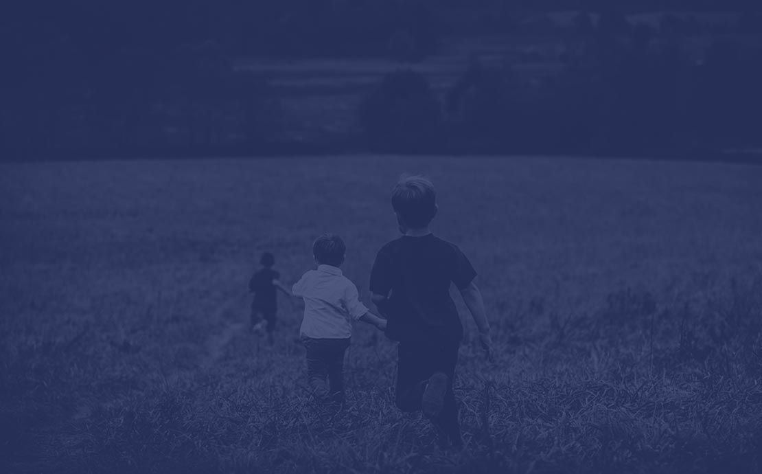 children walking in a field