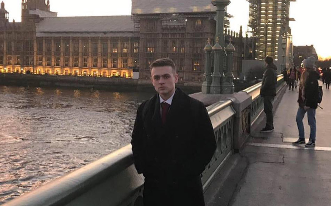 student callum reid-hutchings in front of westminster abbey in london