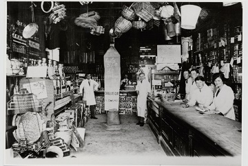 Black and white photograph of interior of Pembroke Dock Co-operative Society store