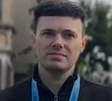An image of a member of university staff presenting a promotional video.