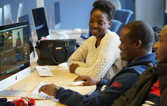 Students working on macs
