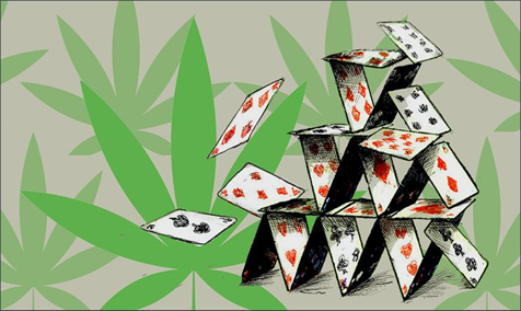 Cannabis leaf and house of cards