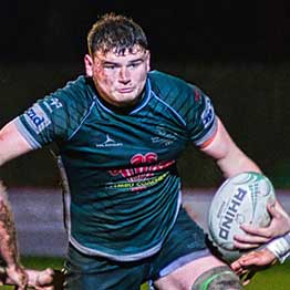 Sport Swansea Scholar Cai Davies running with rugby ball