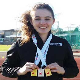 Sport Swansea Scholar Rhian Evans wearing medal