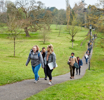 Students walking through the park