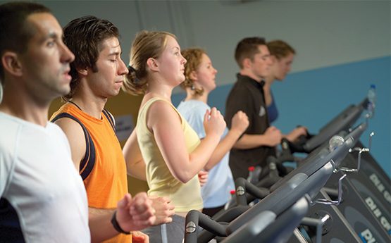 Students hitting the Gym on running machines 