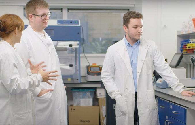 still image of Jordan Copner and HTC Innovation Technologists in the lab