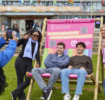 Students on large deck chair