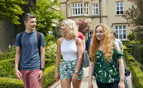 Group of students walking away from the Abbey