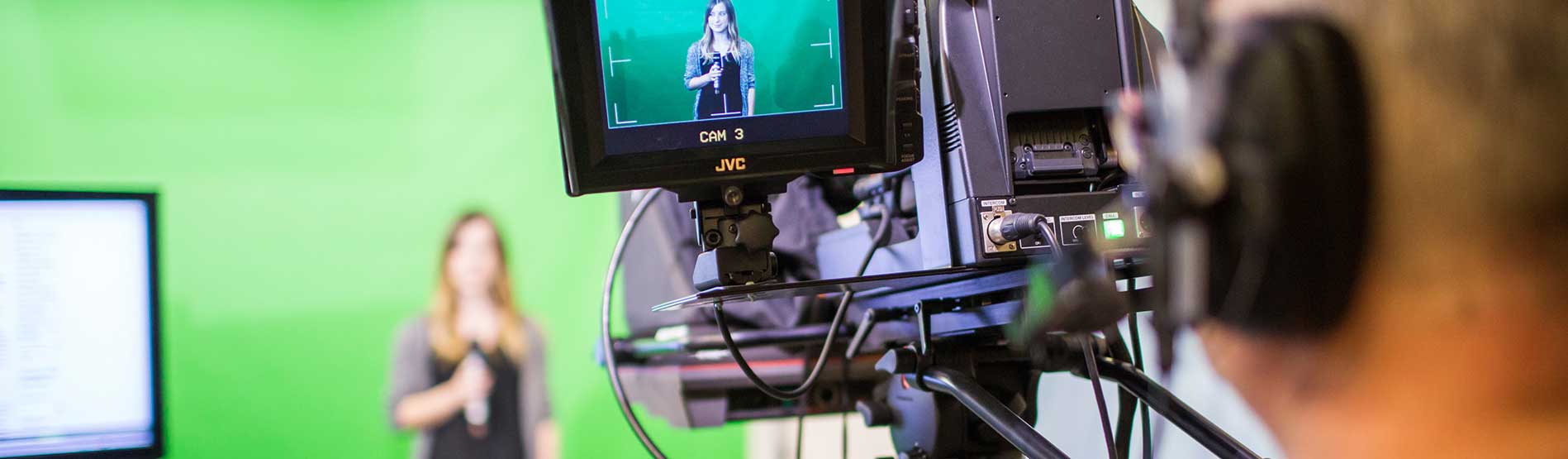 Students filming in the studio