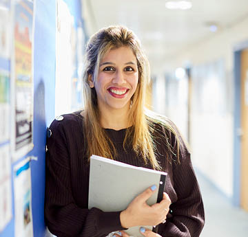 person holding notes