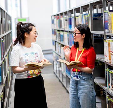 two students in a library