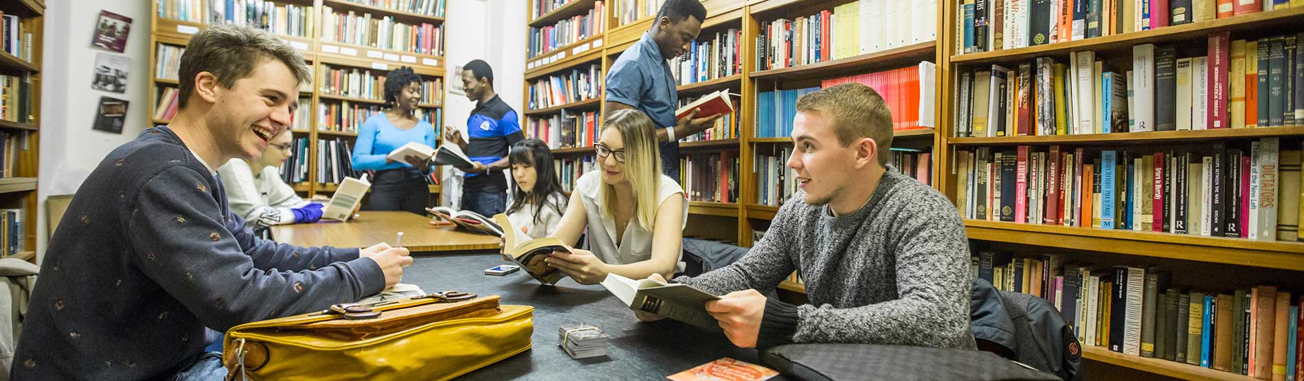 Image of students enjoying their studies in the library