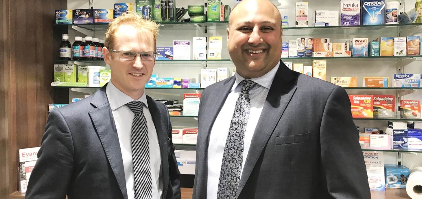 Swansea University’s Head of Pharmacy Andrew Morris pictured with Dr Mo Nazemi at Evans Pharmacy’s Ty Elli branch.