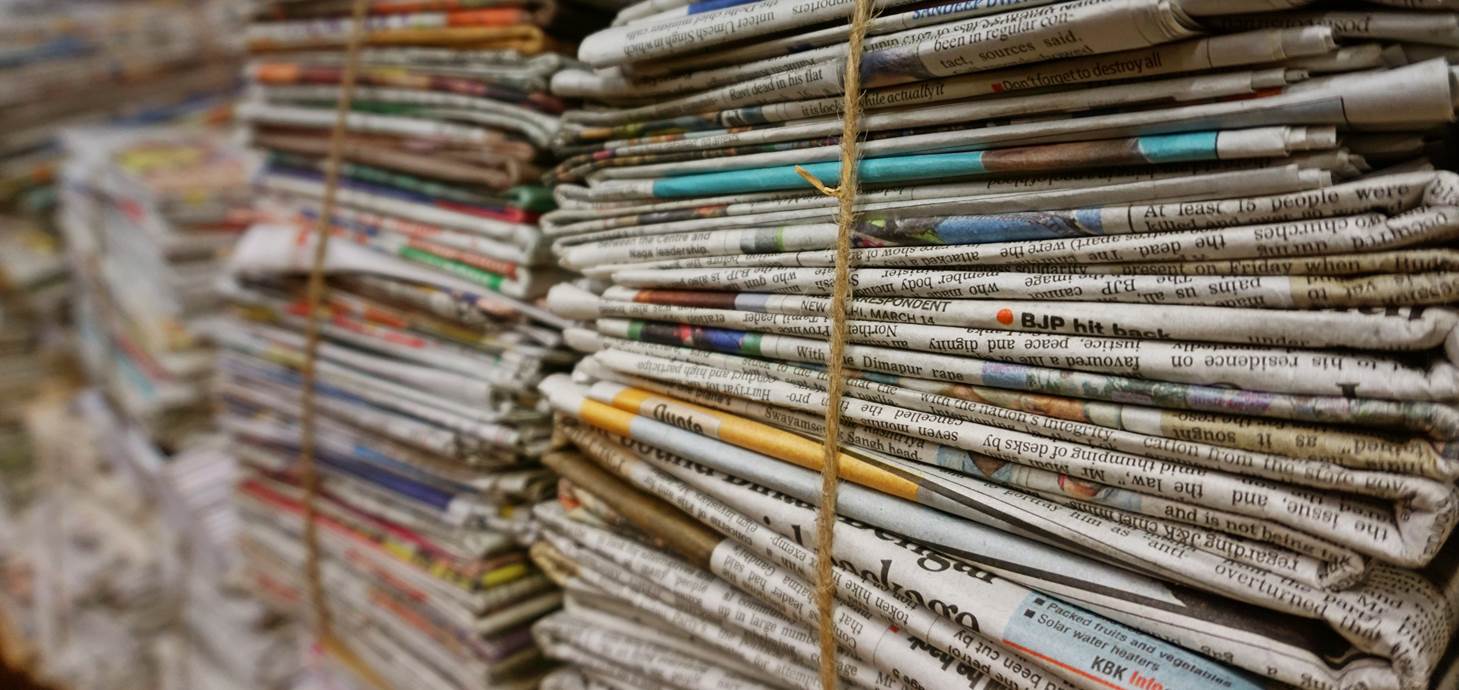 Image of stacked newspapers