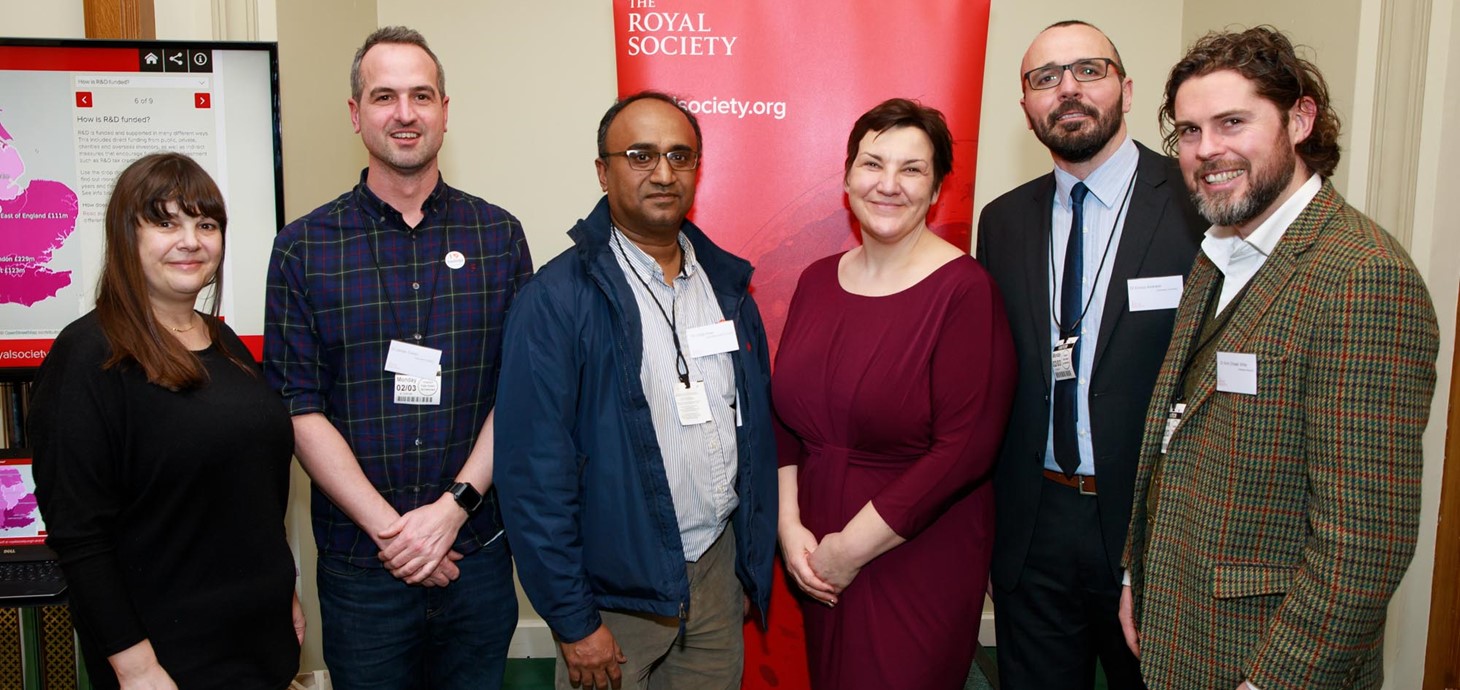 Dr James Cronin (second from left), Dr Enrico Andreoli (second from right) and Dr Alvin Orbaek White (right) at a Westminster reception for all the participants in the Royal Society pairing scheme