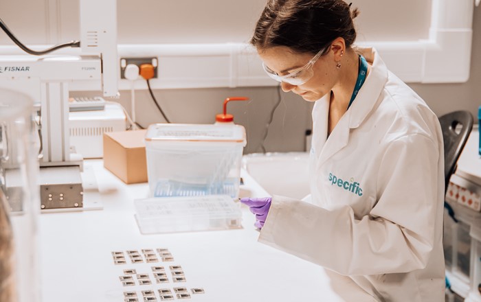 Researcher Carys Worsley at work in the SPECIFIC labs, identifying a safer, greener way to make solar cells 