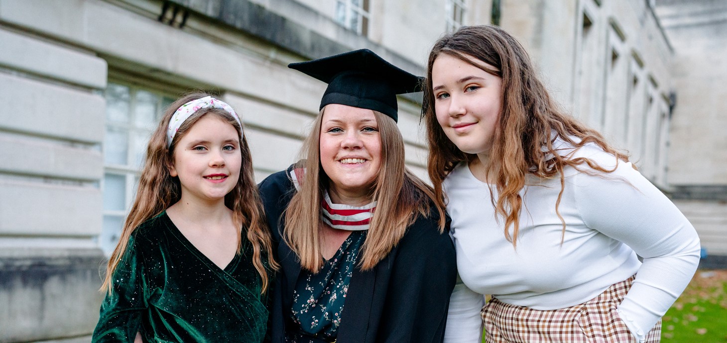 A photo of Bethany Kelly on her graduation day with her two daughters, Everley (on the left) and Isla (on the right).