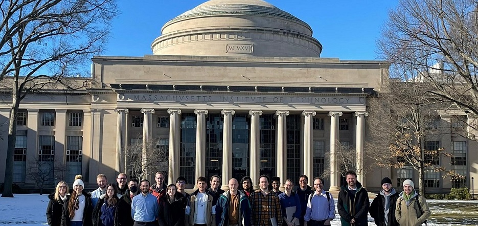 The AIMLAC delegation and members of IAIFI are pictured in front of MIT's Great Dome. 