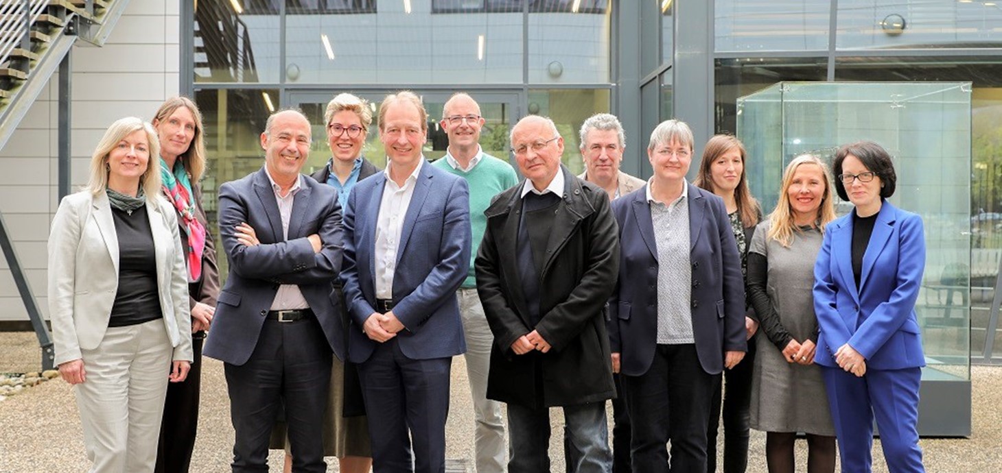 Vice Chancellor Prof Paul Boyle (fifth from left) and Prof Judith Lamie (right end of row) with senior figures from Université Grenoble Alpes 