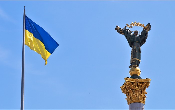 Ukrainian flag and monument to independence:  Independence Square (the Maidan), Kyiv, Ukraine