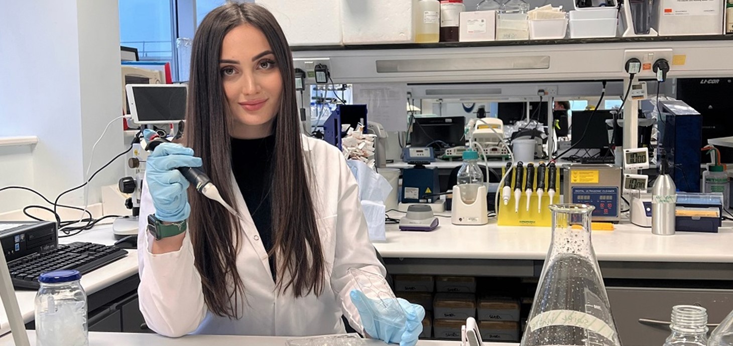 Mariia Hryhorian in the labs at Swansea University Medical School, where she is currently spending a semester as one of the first students to benefit from Swansea's partnership with her home university in Ukraine