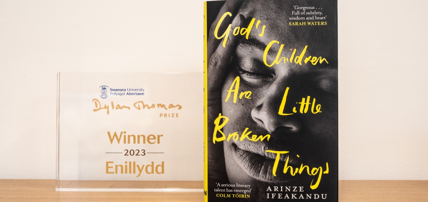  God’s Children Are Little Broken Things book next to the winner's plaque 