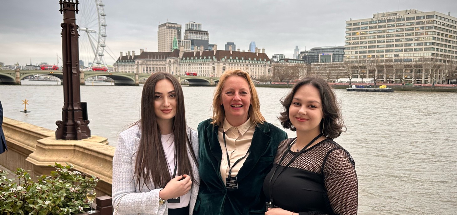 Mariia Hryhorian, Emma Frearson Emmanuel, Associate Director of Marketing, Recruitment and International at Swansea University and Daryna Popova at the House of Lords reception.