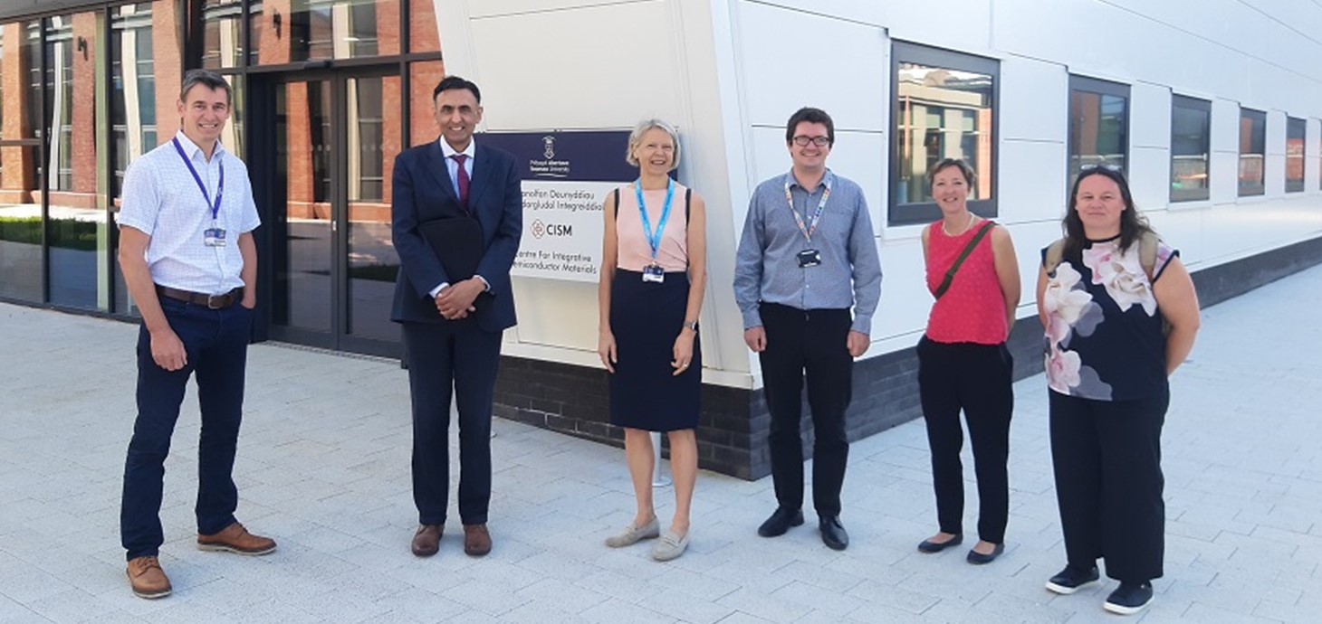 Picture:  Professor Jas Pal Badyal (second from left) and Professor Helen Griffiths (third from left); with Prof Badyal’s colleagues (far right) Amy Hatt and Julie Cunnington Hill, and Dr Matt Elwin (left) and Prof Ian Mabbett (third from right) of Swansea University. 