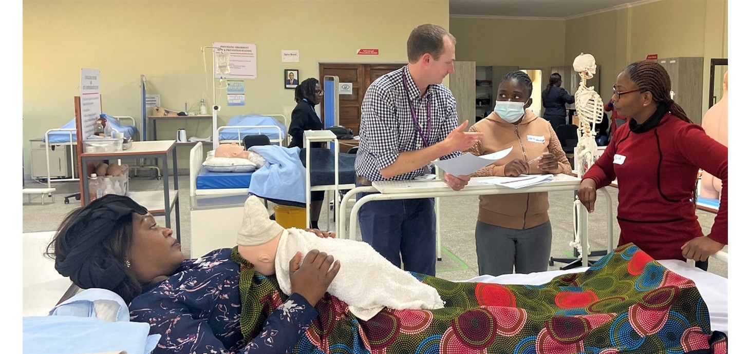 Dr David Lee of Swansea University Medical School with Zambian health professionals at the clinical simulation workshop. Swansea has significant expertise in the field through its SUSIM centre and in developing highly realistic clinical simulation scenarios for student training.