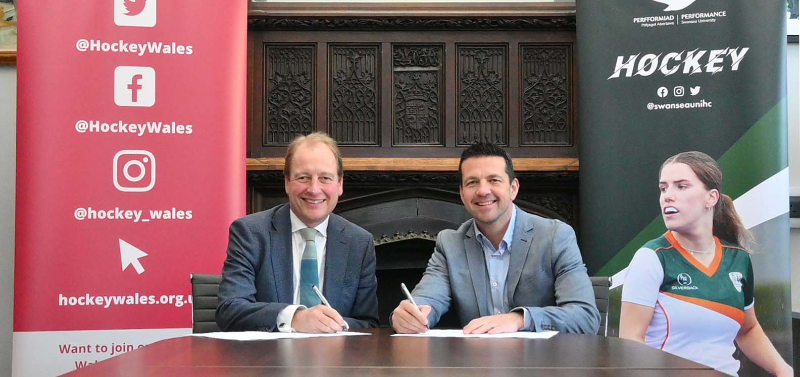 Swansea University's Vice-Chancellor Professor Paul Boyle and Hockey Wales Chief Executive Paul Whapham 