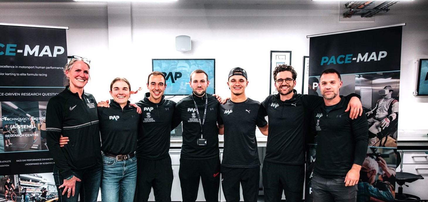 Lando Norris (third from right) at Swansea University A-STEM labs. Also pictured are (R-L) : Dr. Mark Waldron (Swansea University); Jon Malvern (Director, PAP); Joe Page, Christian Vassallo (PACE-MAP, Swansea University), Mylène Vonderscher (Université Savoie Mont Blanc), Bec Dietzig (Swansea Uni)