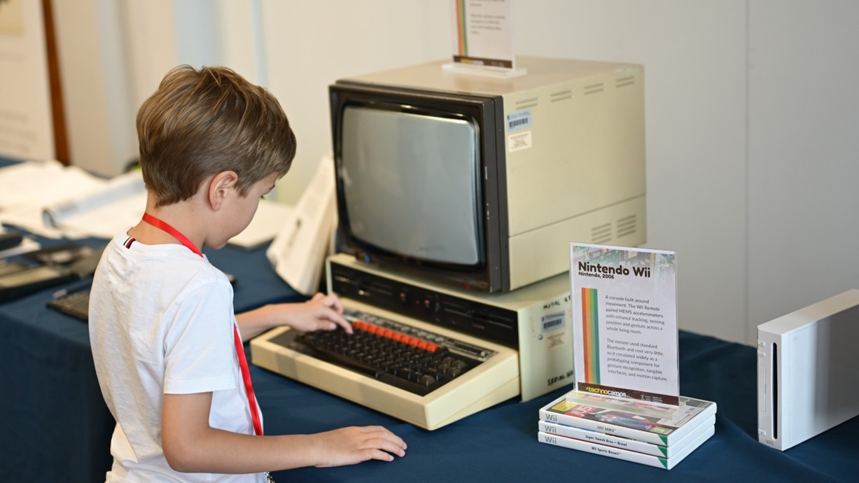 A photo of a child using the BBC Microcomputer System.