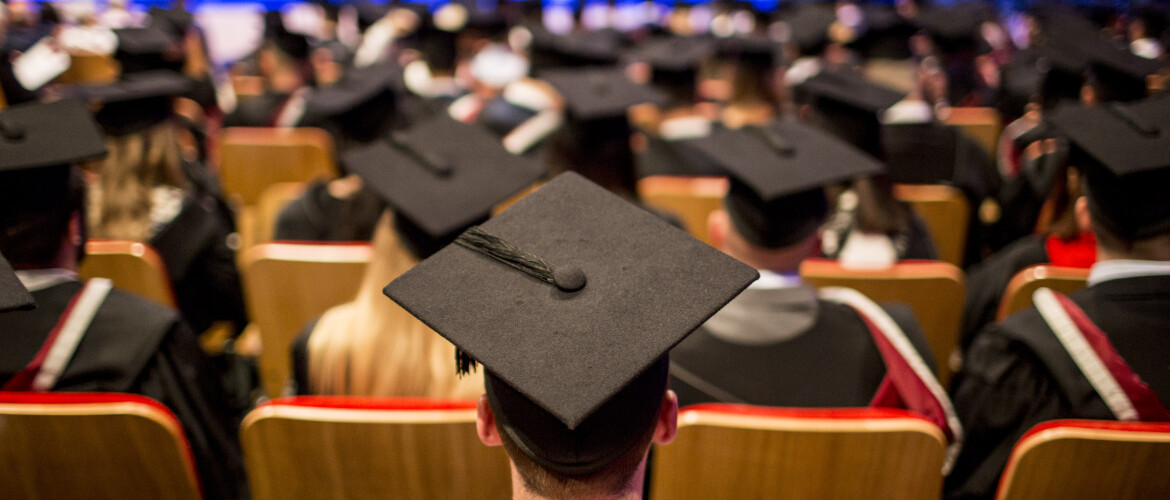 Graduates sitting in their graduation ceremony