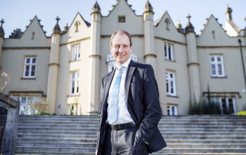 Chair of Universities Wales and Vice Chancellor of Swansea University, Professor Paul Boyle outside the university’s Singleton Abbey. 