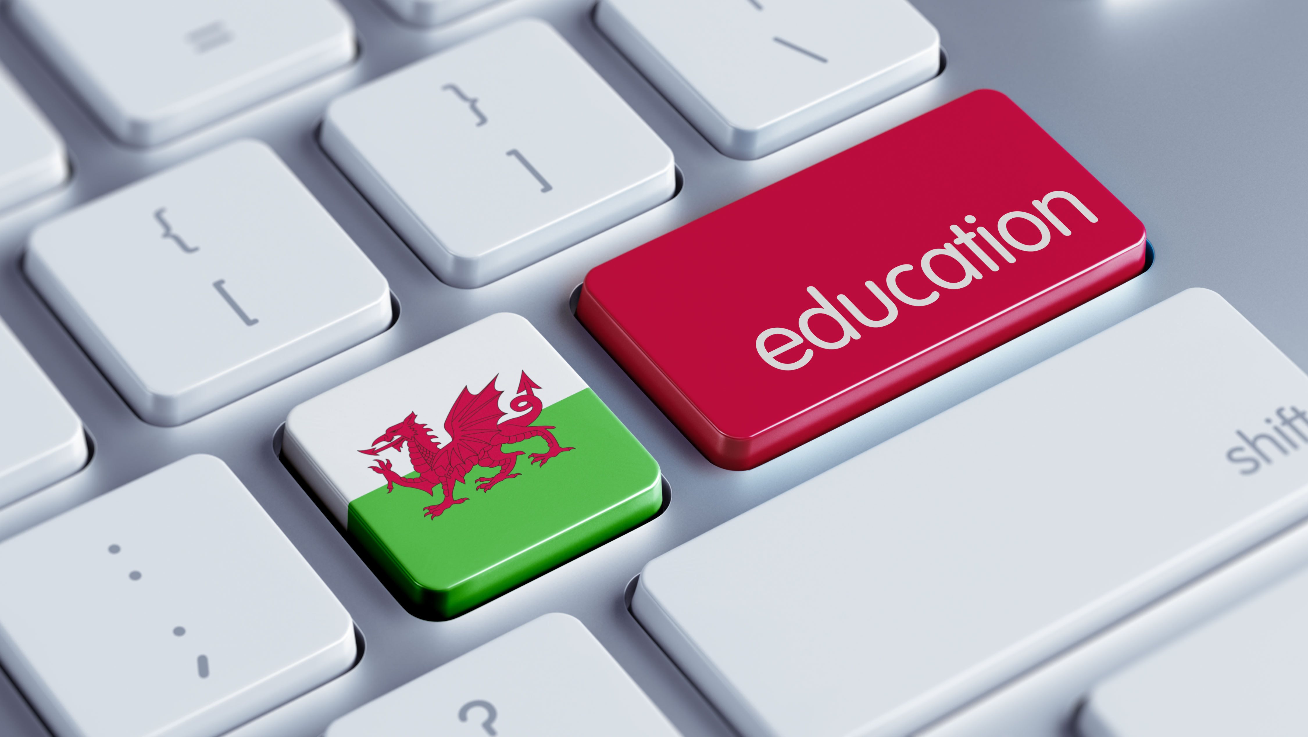 computer keyboard with the Welsh flag and the word 'education' on