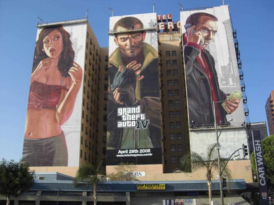 Large advertisement on the side of an urban building