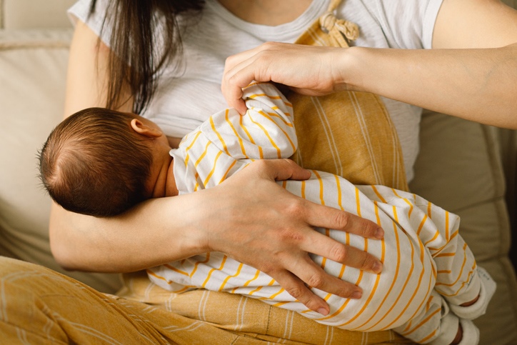 Newborn baby breastfeeding 