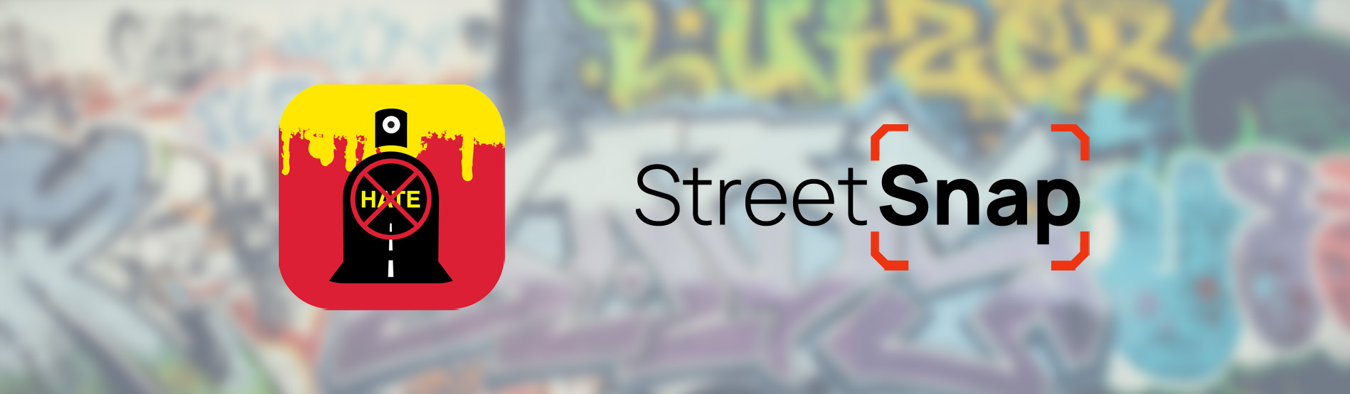 A wall of graffiti with the StreetSnap logo