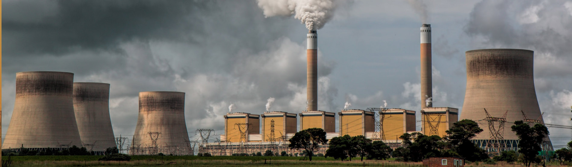 As series of industrial chimneys exhausting gases