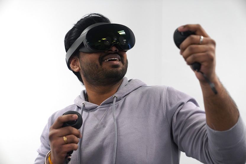 Male student using a VR headset