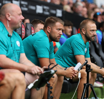 Football players waiting to play