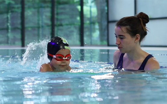 Swimming lesson with a young child
