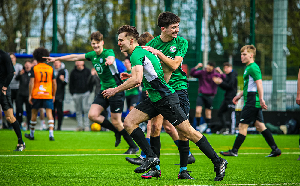 One of Swansea University's Intramural Football leagues playing in green shirts