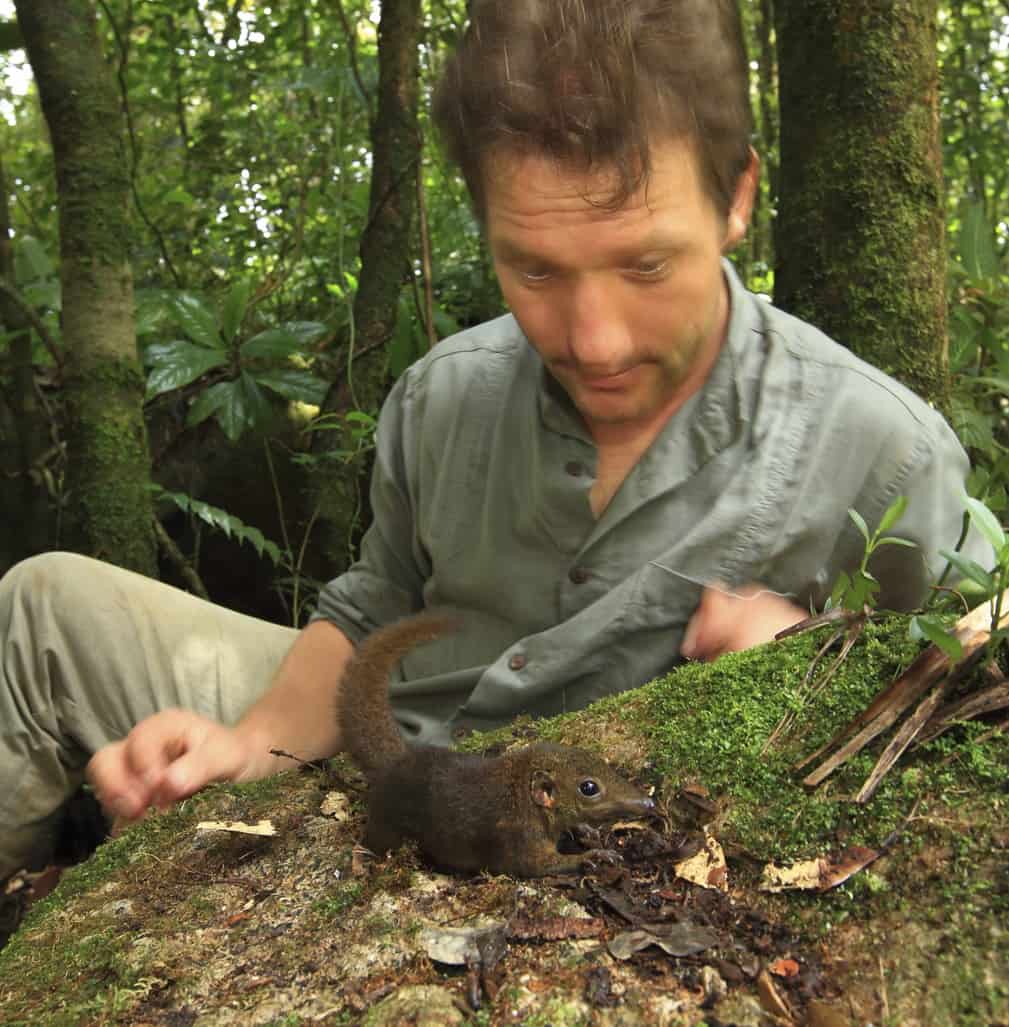 Konstans Wells with a montane treeshrew in Borneo